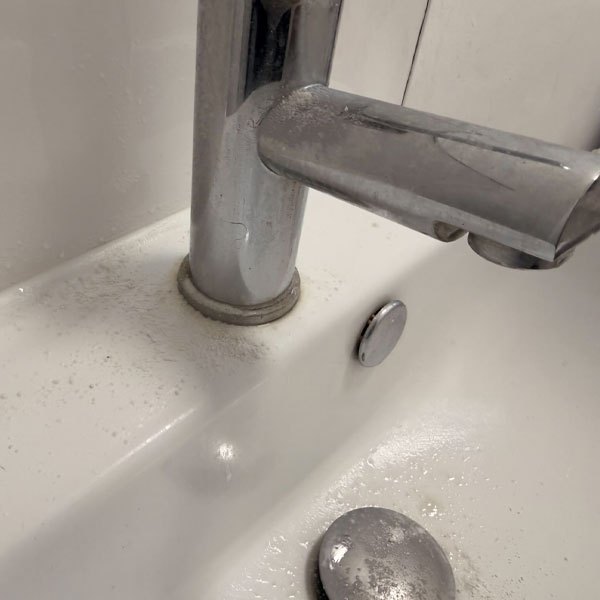 Basin taps before cleaning