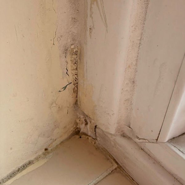 Window corner before cleaning